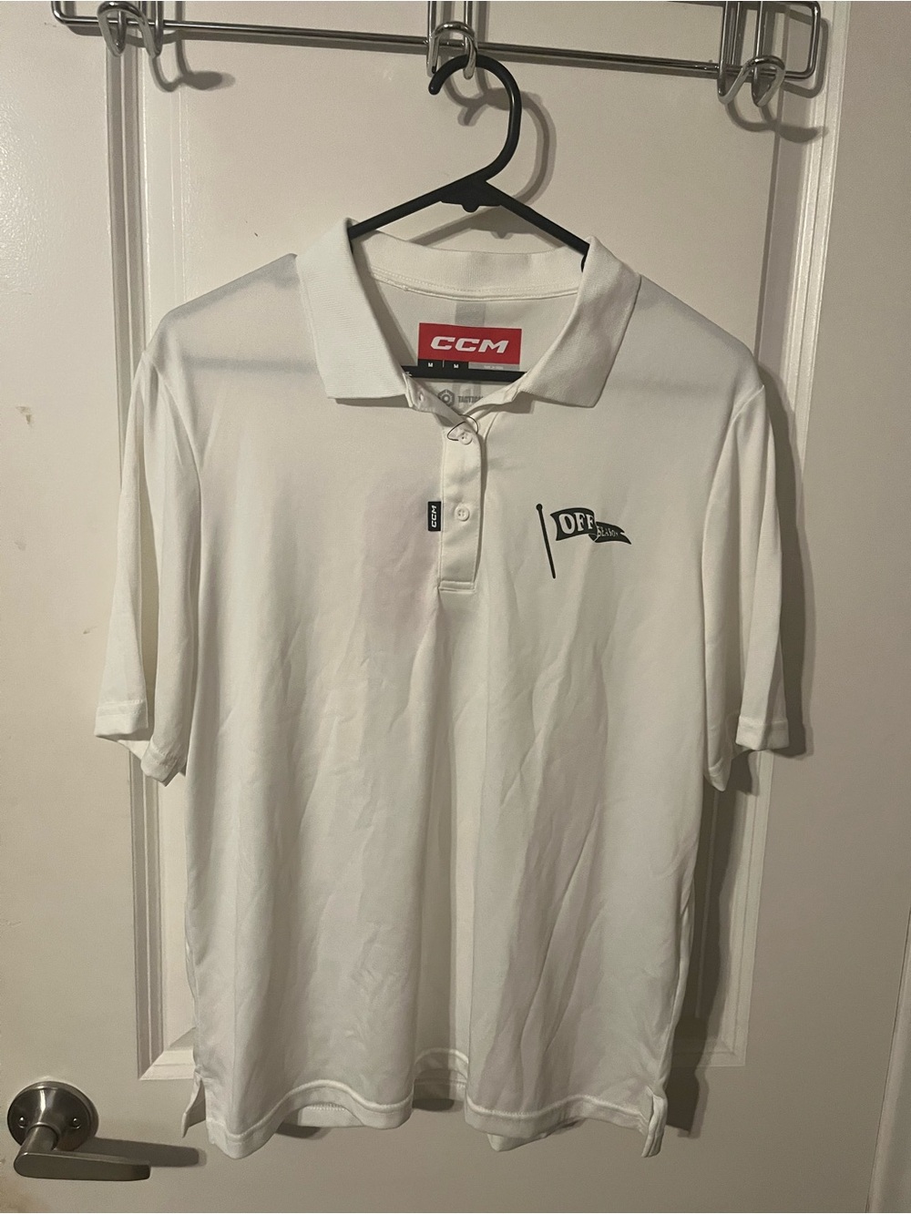 CCM White Women's Button-Down Polo with Flag Logo